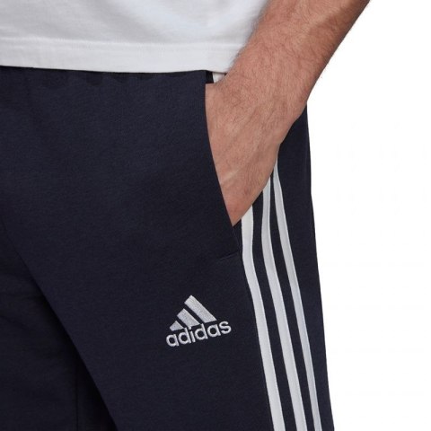 Spodnie adidas Essentials Tapered Elastic Cuff 3 Stripes Pant M GK8830